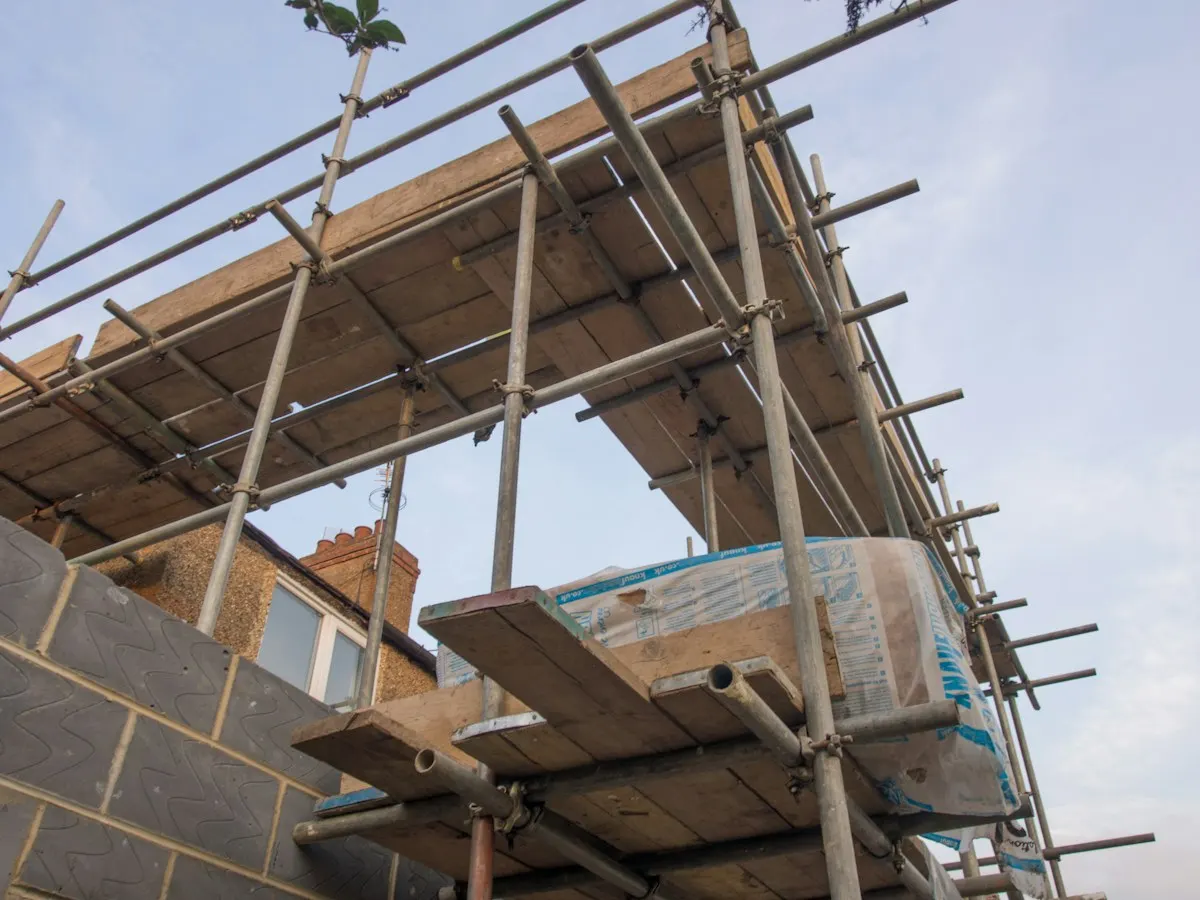 Close view of blockwork and scaffolding on a house extension
