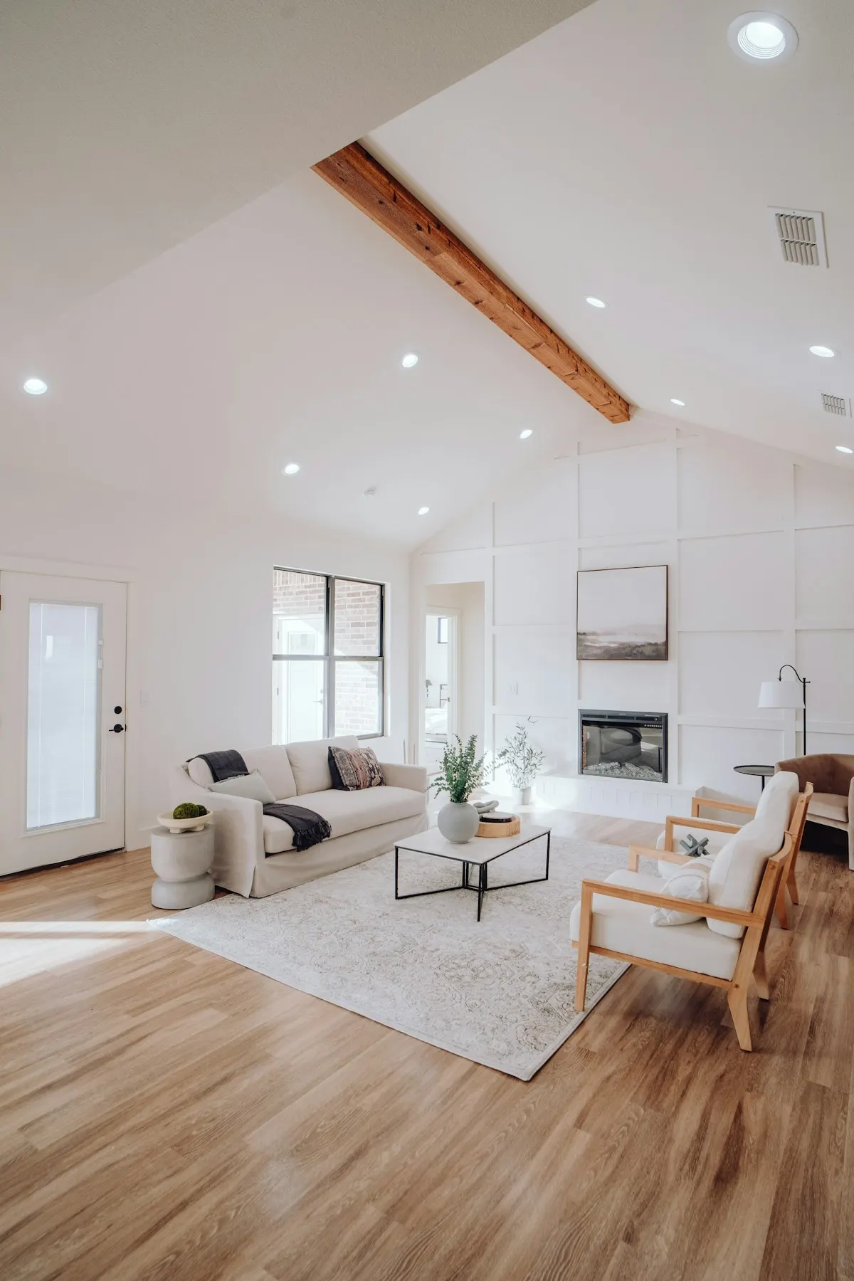 Open living and dining space with timber flooring
